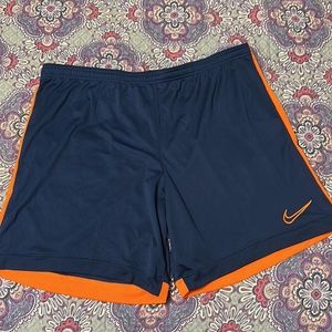 Nike Dri-Fot shorts Navy Blue with Orange Strip down the sides